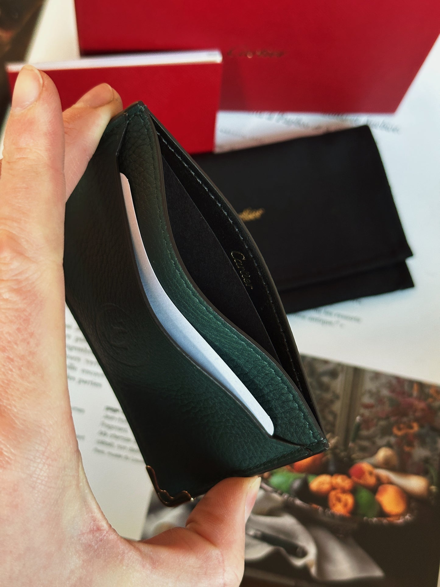 Cartier card holder in bottle green grained leather
