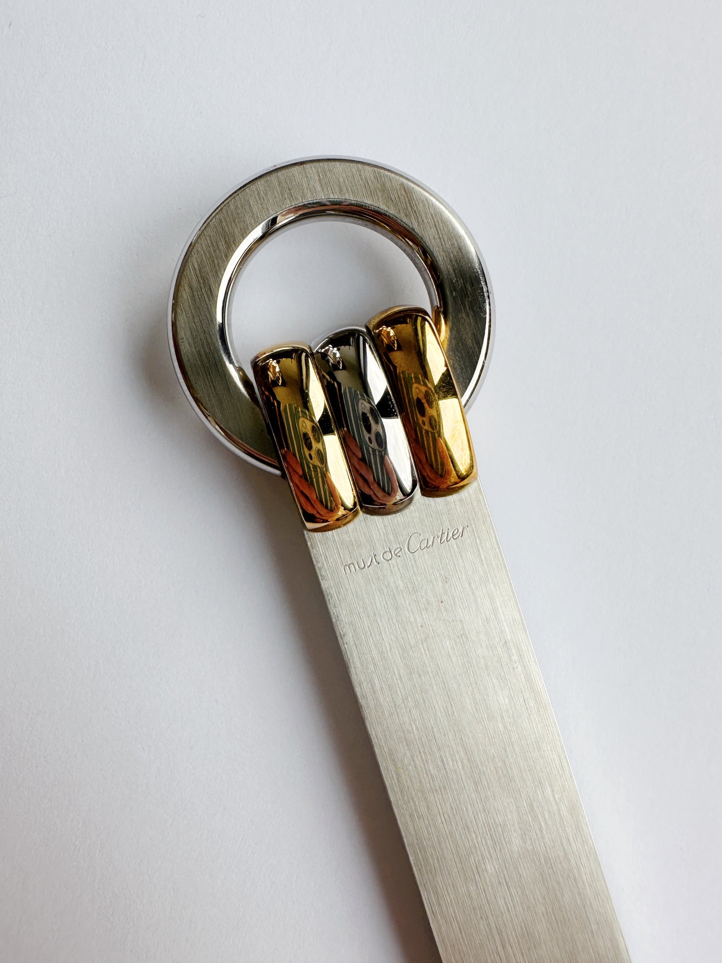 Must de Cartier paper knife in gold and brushed steel