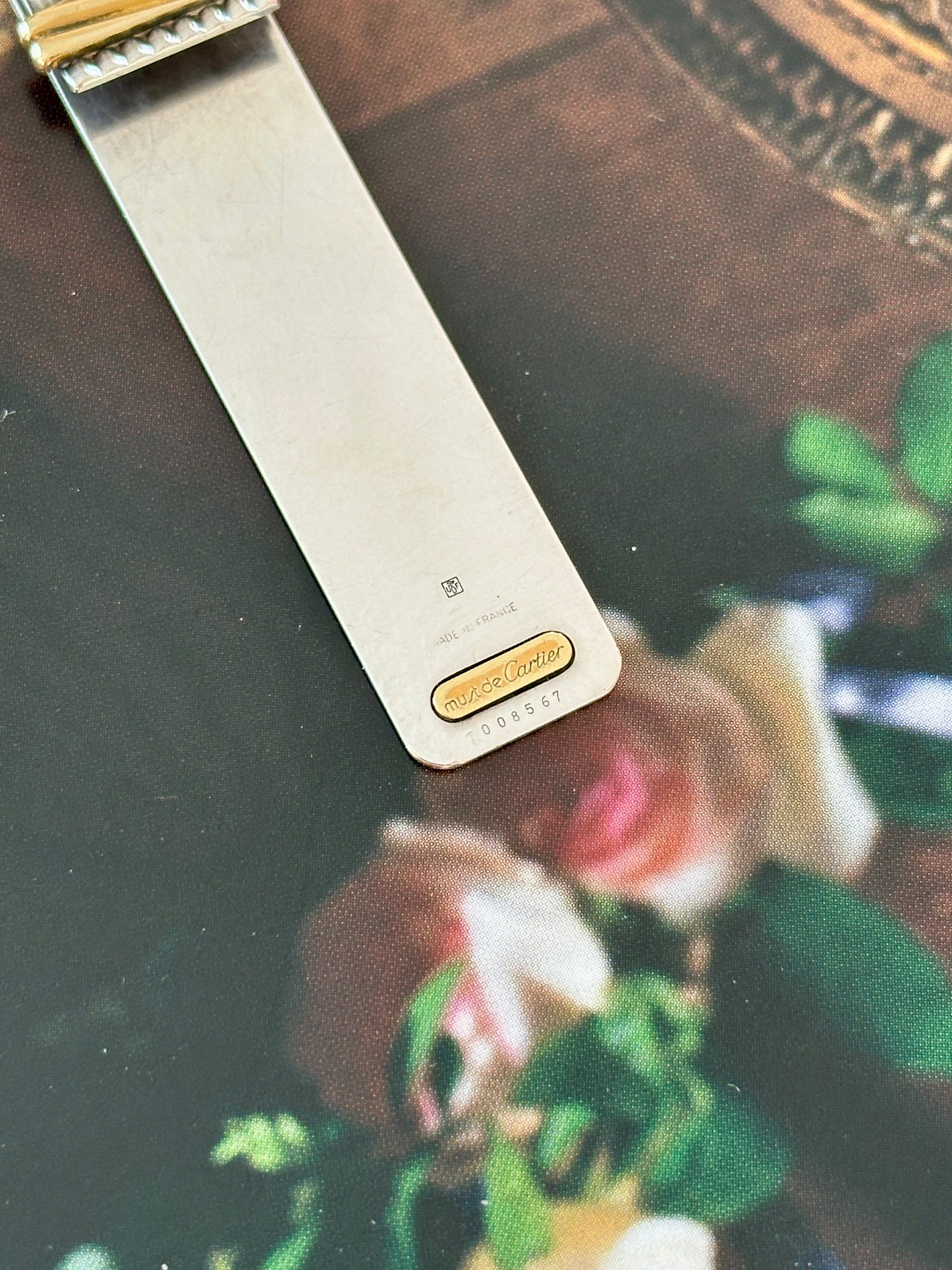 Pince à billets / marque page Cartier Must argent et or striée
