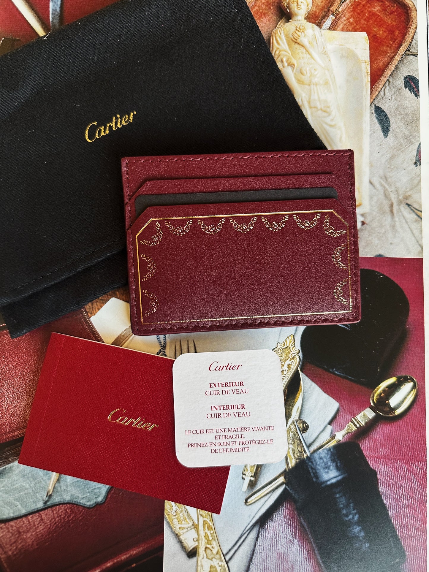 Cartier card holder in burgundy calfskin leather