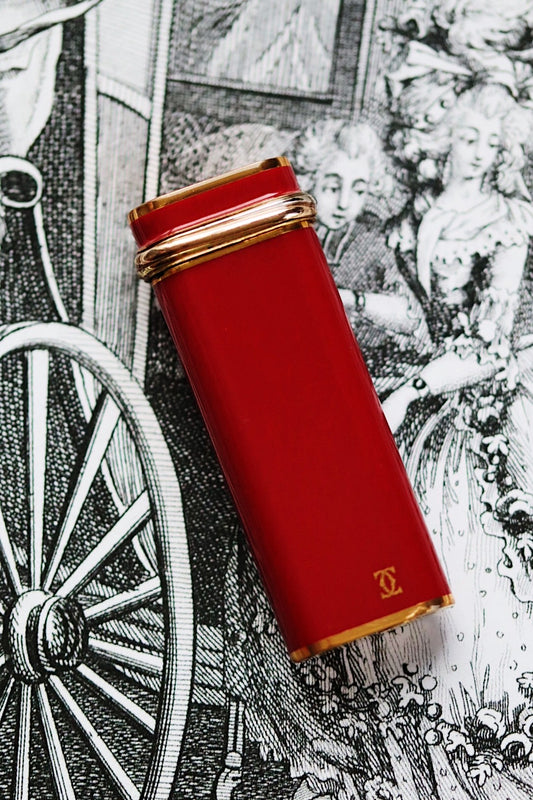 Cartier Trinity lighter, red lacquered with three gold accents