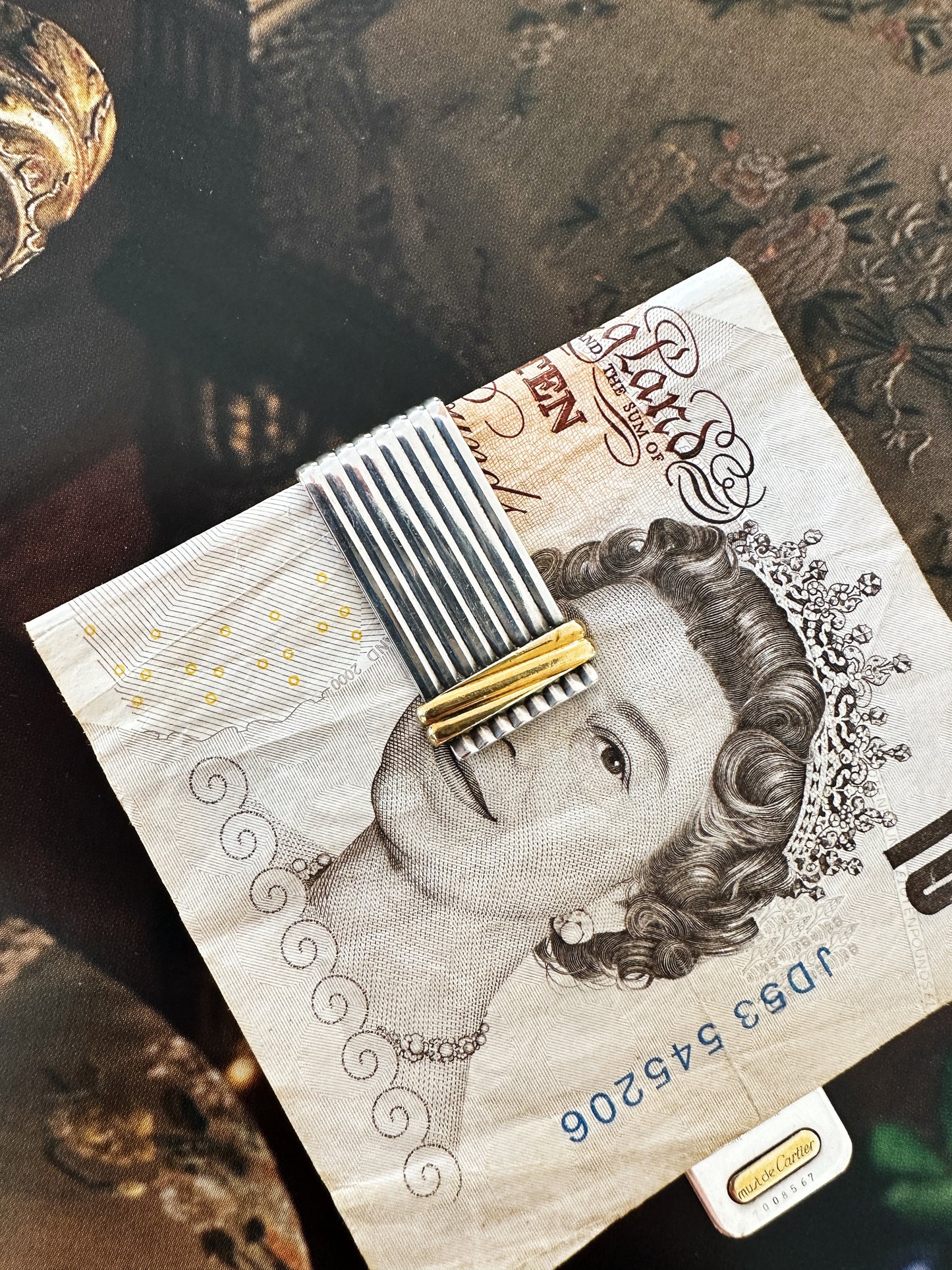 Pince à billets / marque page Cartier Must argent et or striée