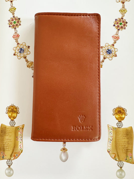 Agenda et répertoire téléphonique Rolex 1996 en cuir lisse camel