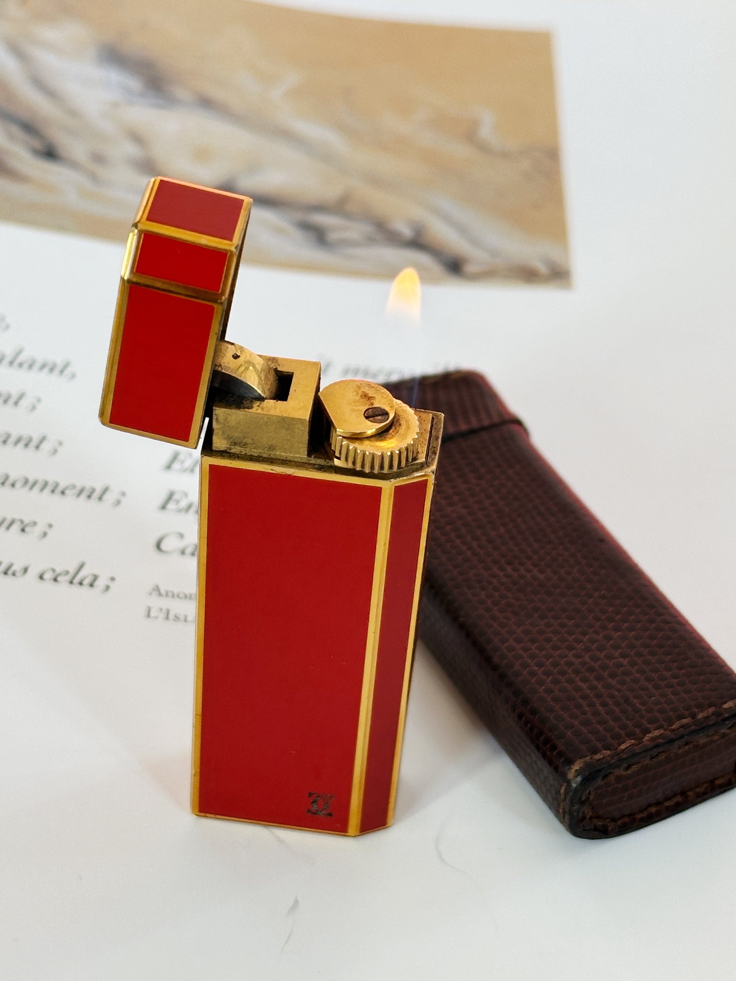 Vintage Cartier pentagon lighter, lacquered red-orange