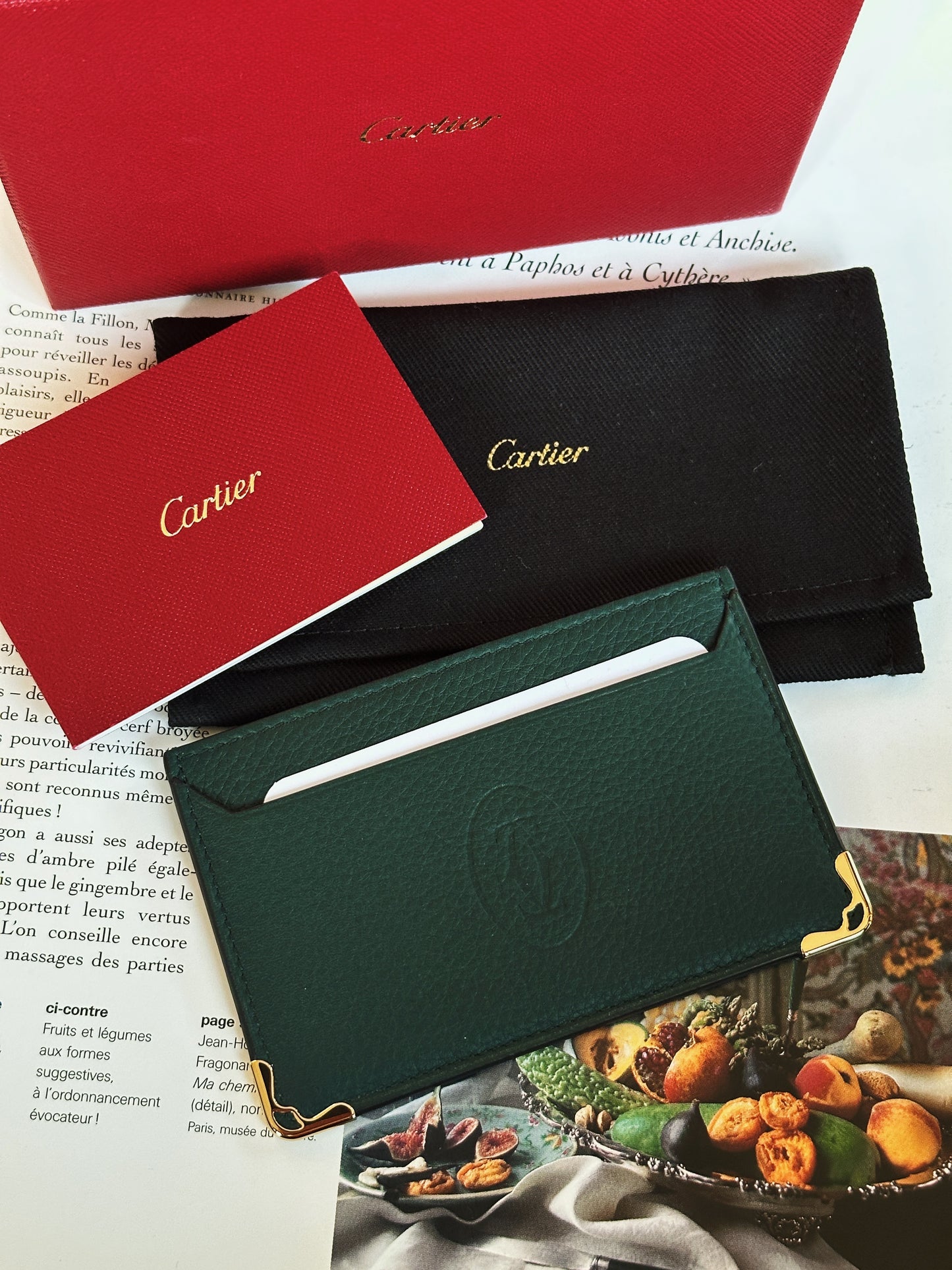 Cartier card holder in bottle green grained leather
