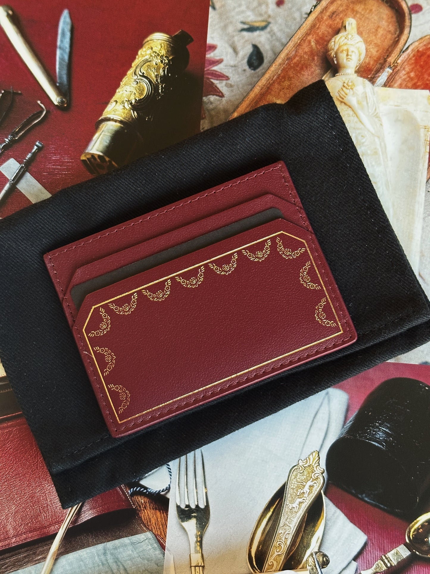 Cartier card holder in burgundy calfskin leather