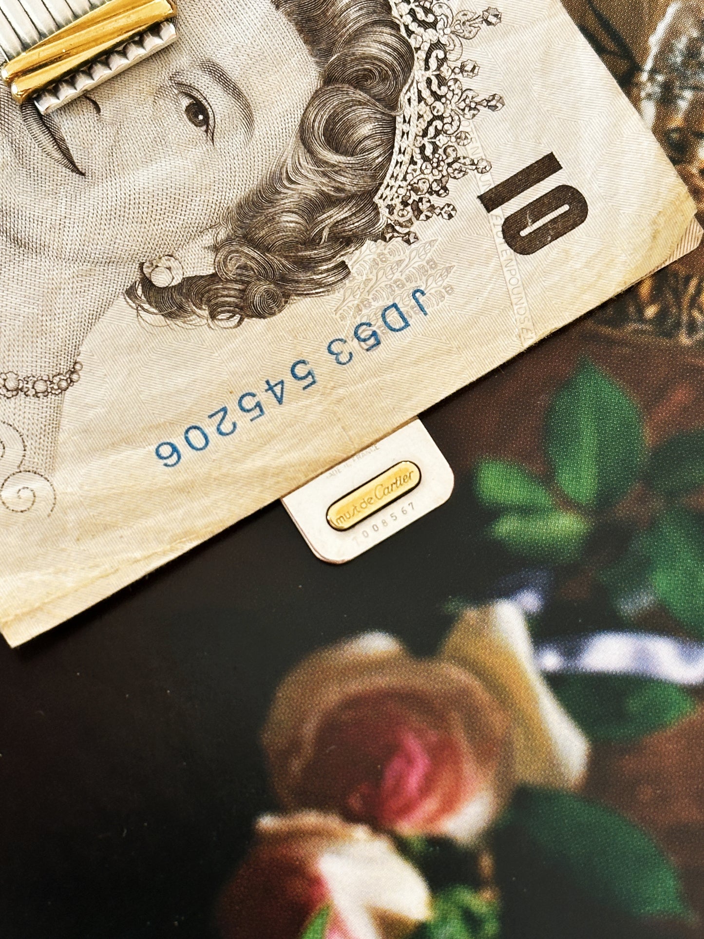Pince à billets / marque page Cartier Must argent et or striée