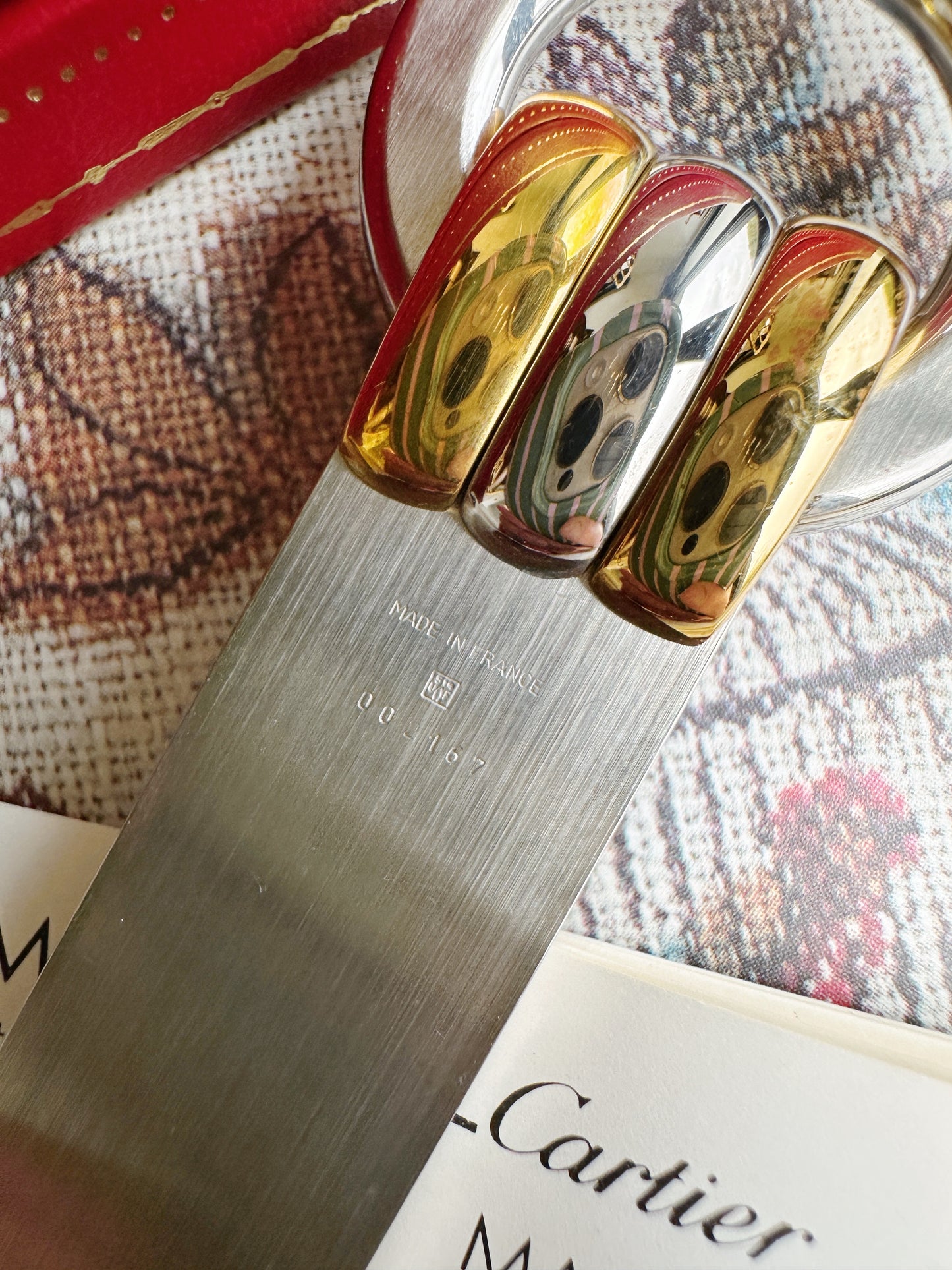 Must de Cartier paper knife in gold and brushed steel