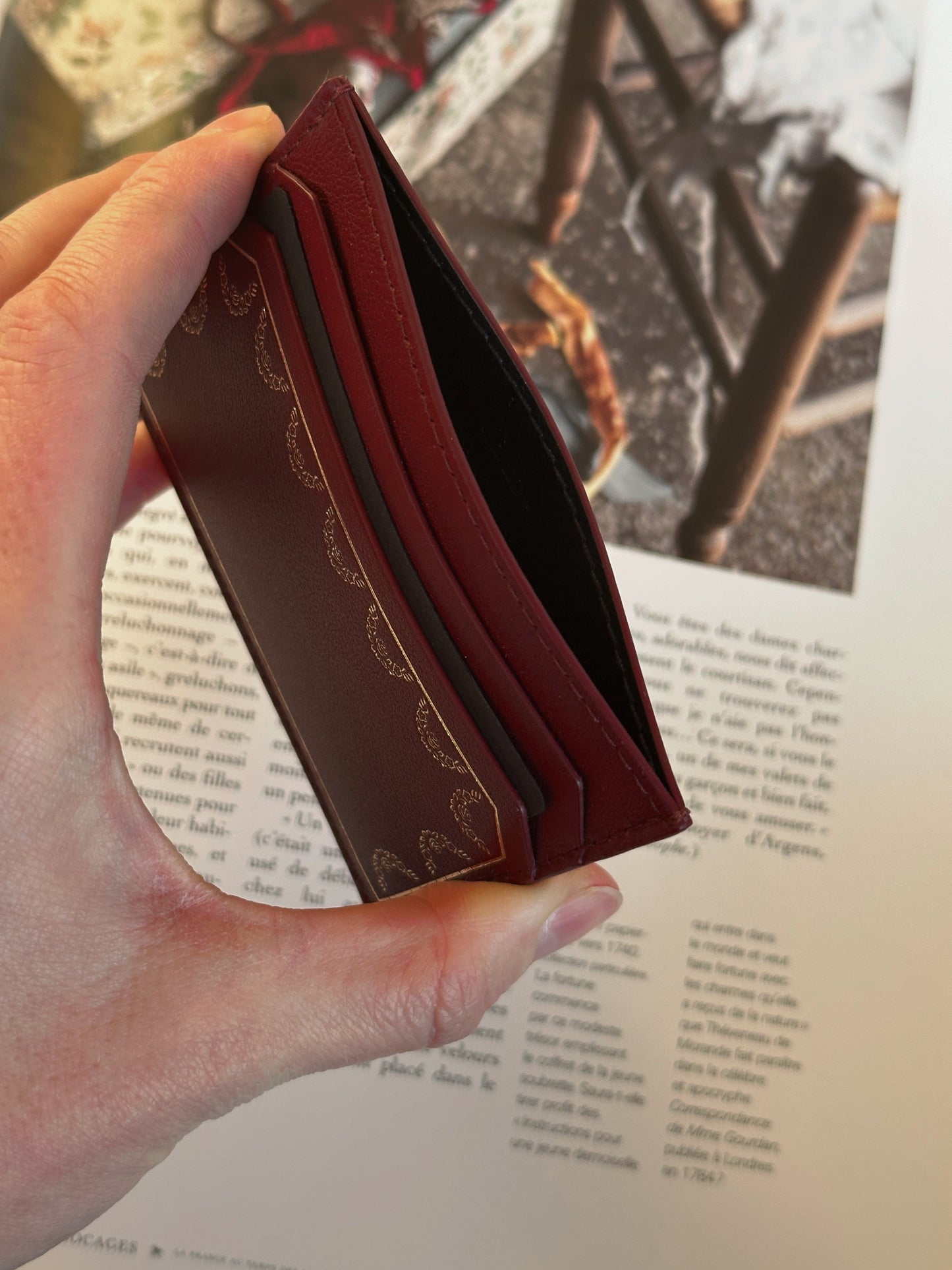Cartier card holder in burgundy calfskin leather