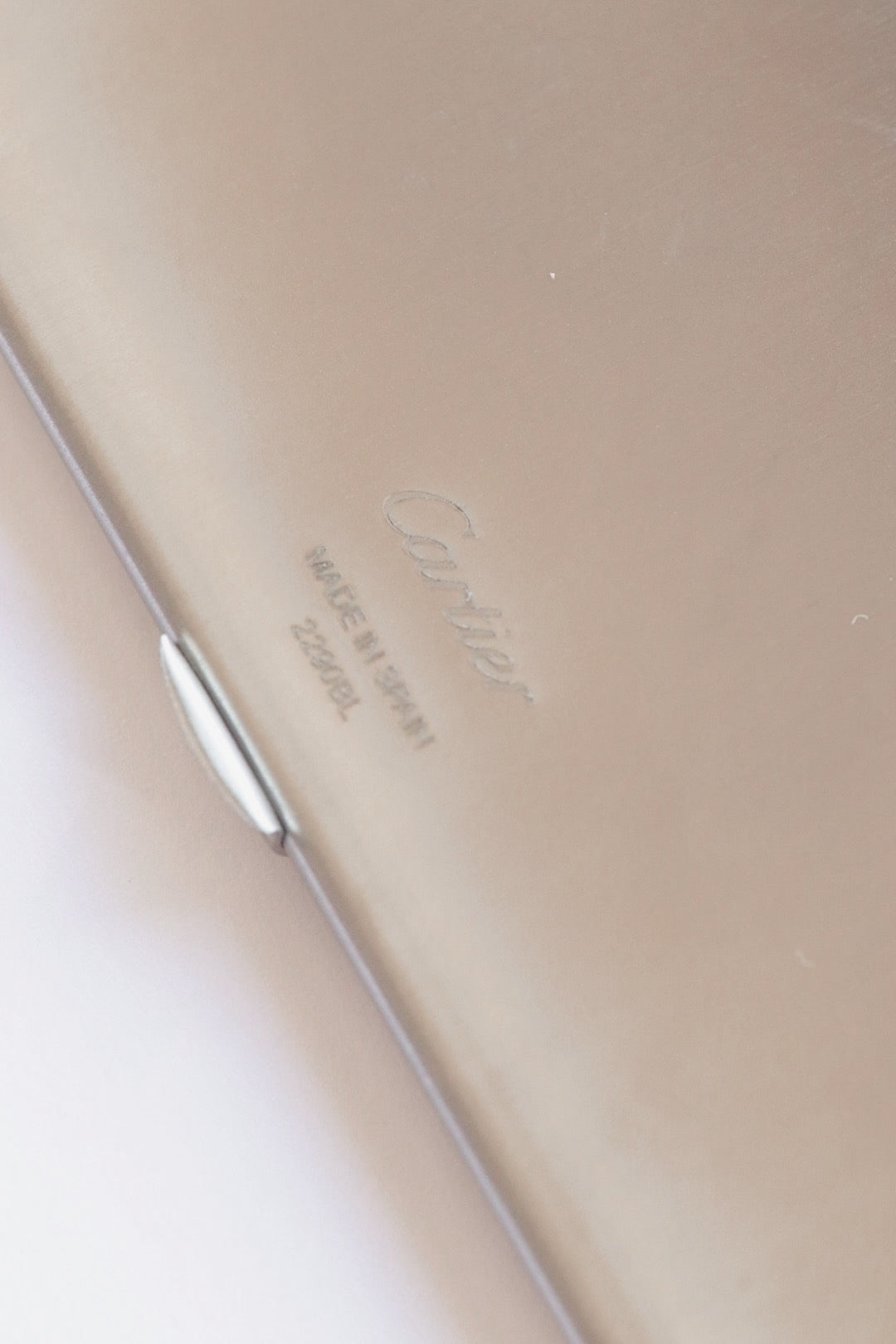 Cartier Santos card holder – Brushed steel and gold, an emblem of watchmaking elegance 