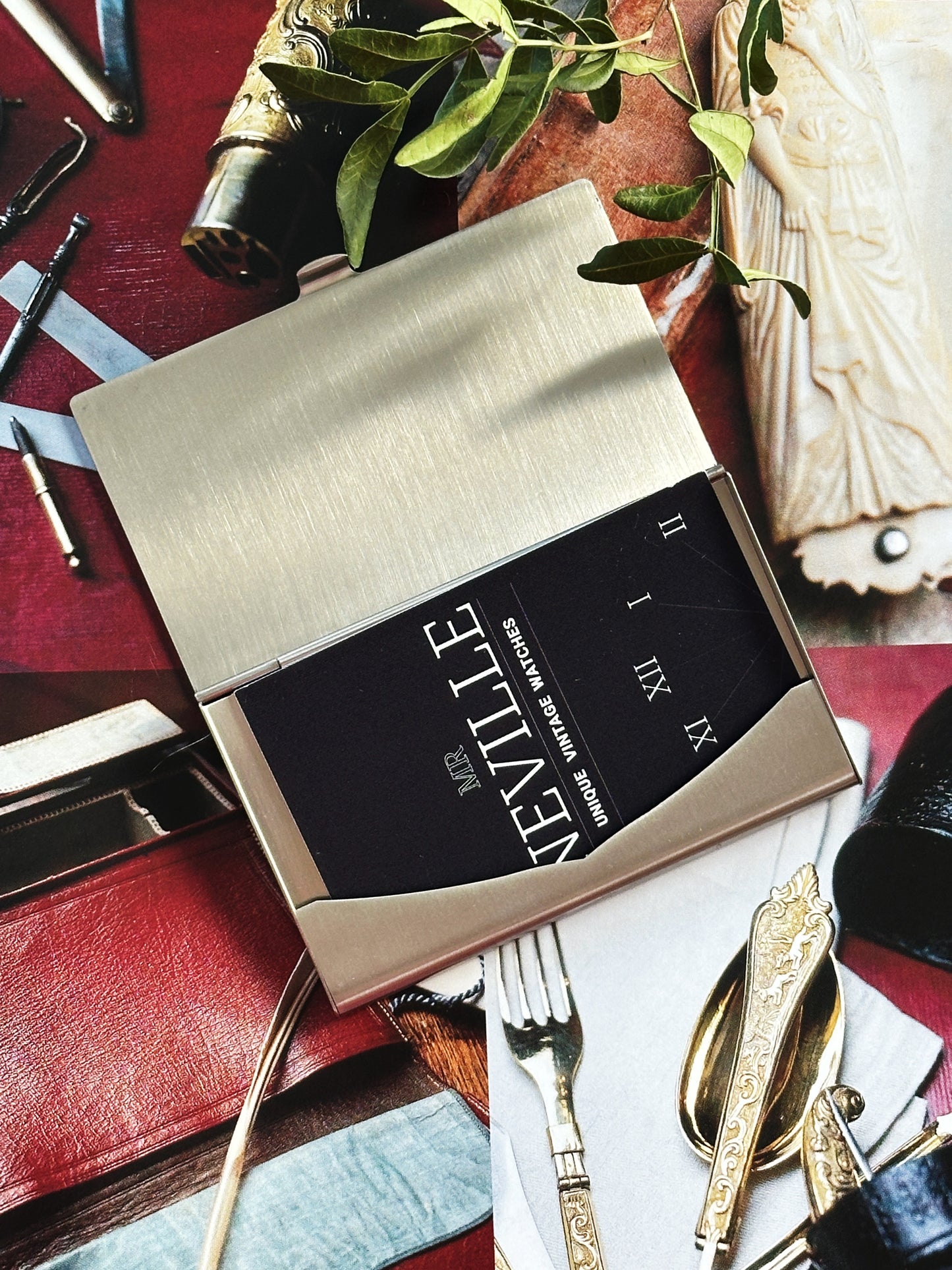 Cartier Santos card holder – Brushed steel and gold, an emblem of watchmaking elegance 