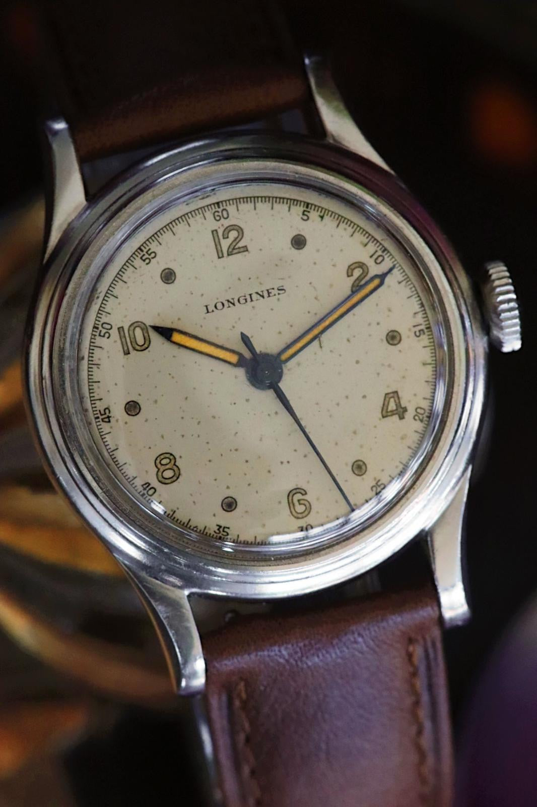 Longines vintage militaire vers 1948 — Cadran crème et aiguilles à patine orange « pumpkin »