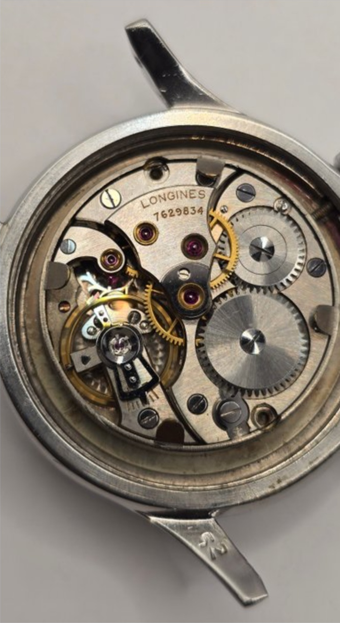 Longines vintage militaire vers 1948 — Cadran crème et aiguilles à patine orange « pumpkin »