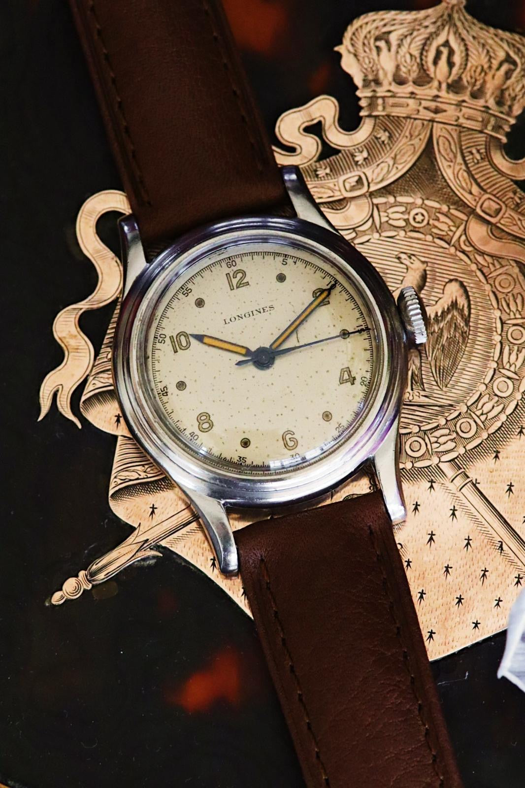 Longines vintage militaire vers 1948 — Cadran crème et aiguilles à patine orange « pumpkin »