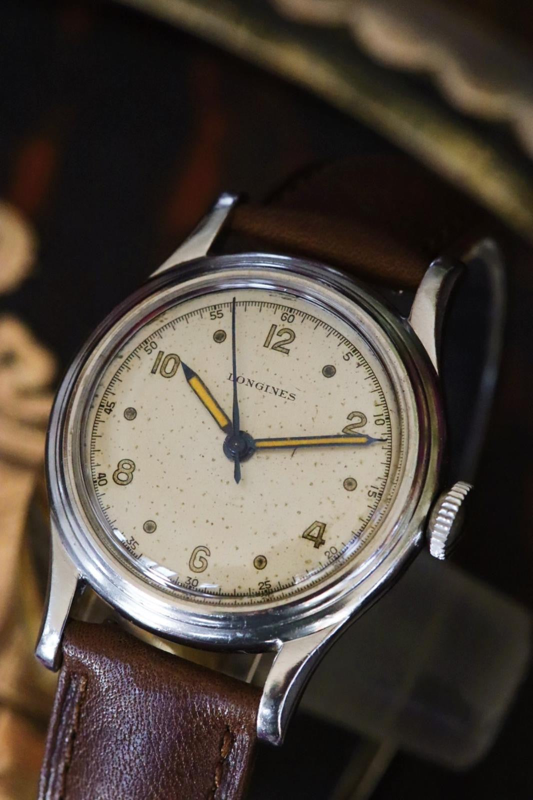 Longines vintage militaire vers 1948 — Cadran crème et aiguilles à patine orange « pumpkin »